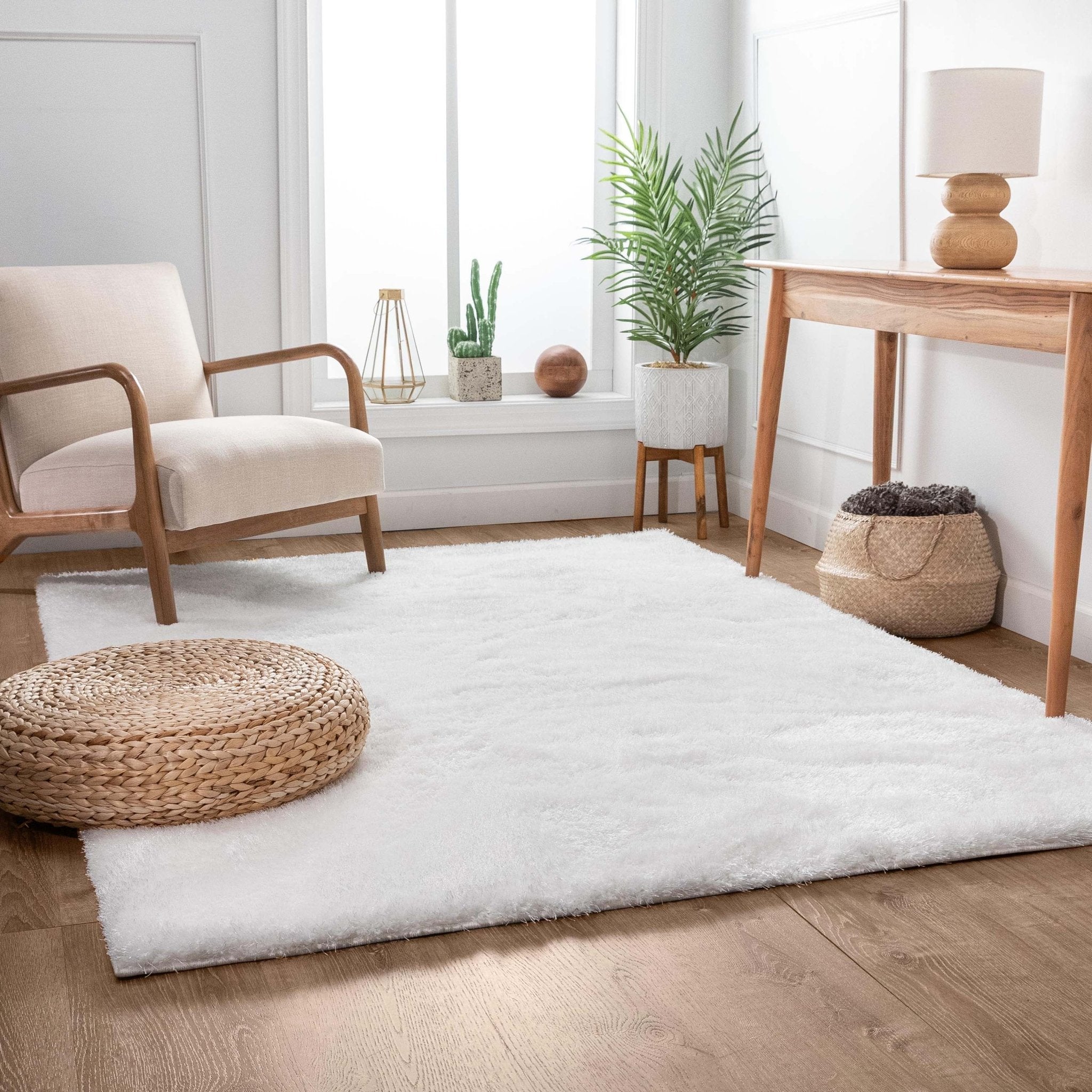 Feather Collection Liza White Shag Rug – Sparkly, Plush, Minimalist Glam - Well Woven - solid white shag rug in a living room