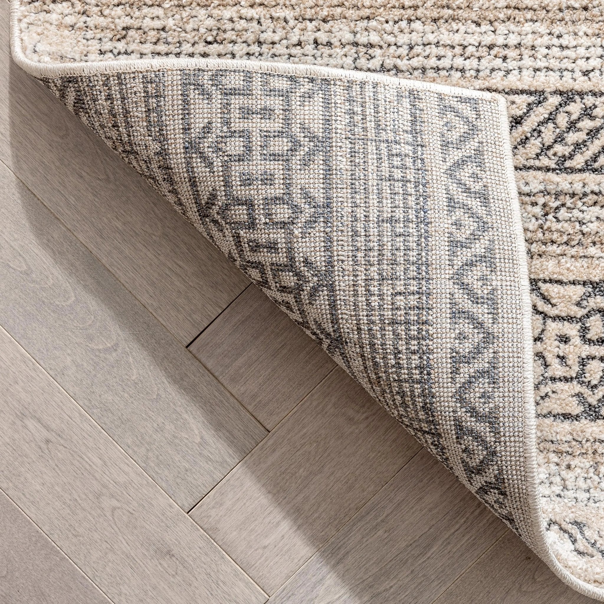 Fresco Tribal Geometric Beige Distressed High-Low Rug Well Woven