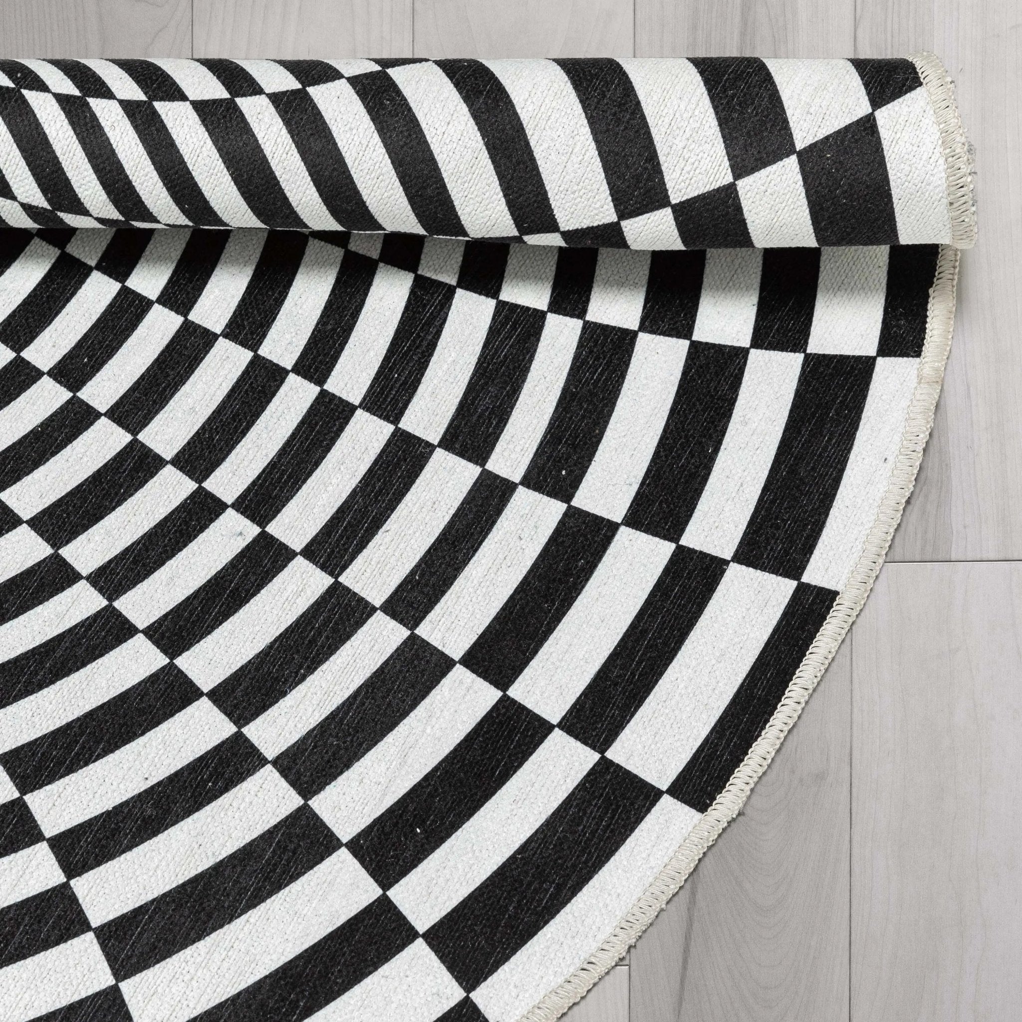 Vortex 3D Bottomless Hole Black Ivory Area Flat-Weave Rug Well Woven