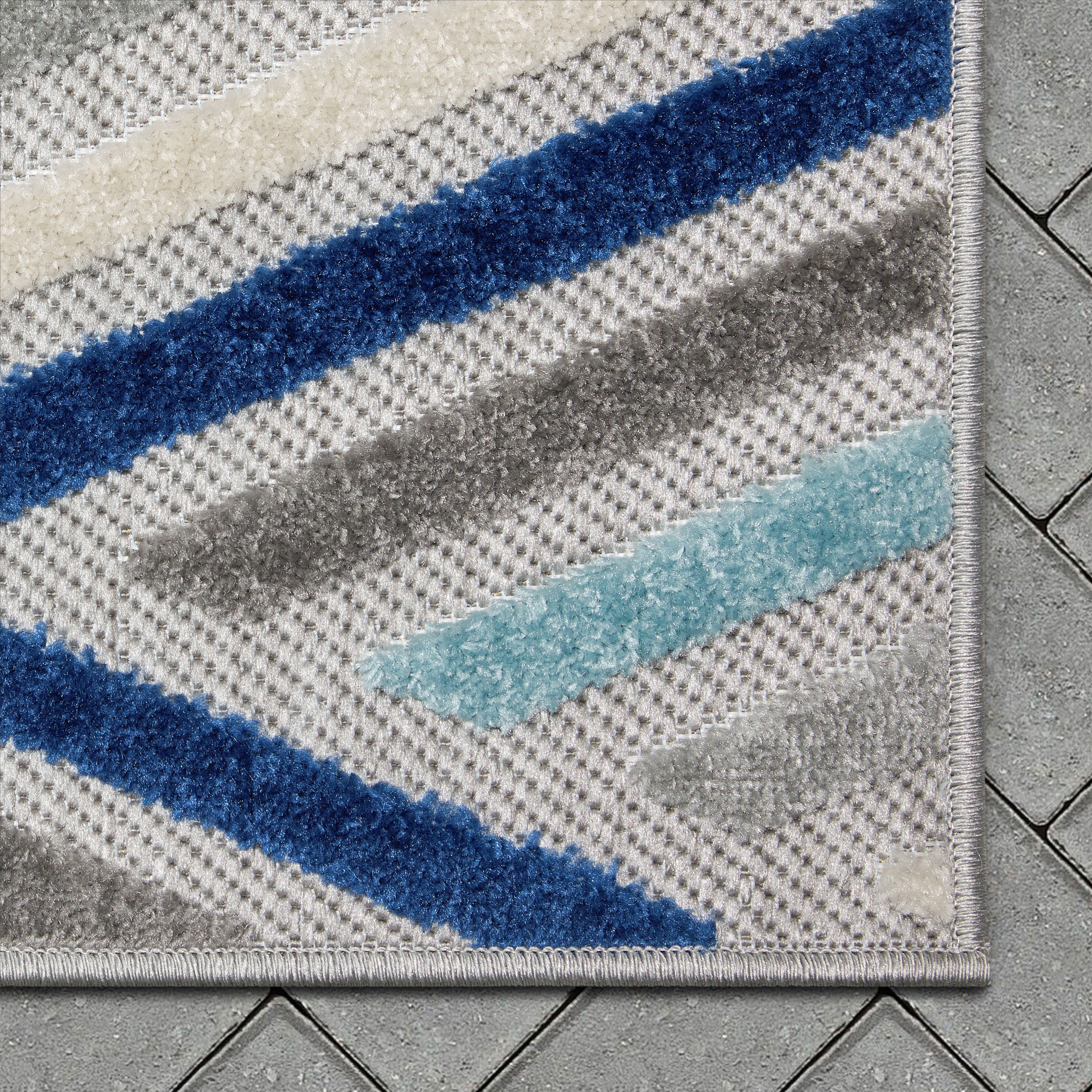 Neema Modern Chevron Striped Indoor/Outdoor Grey Blue High-Low Rug