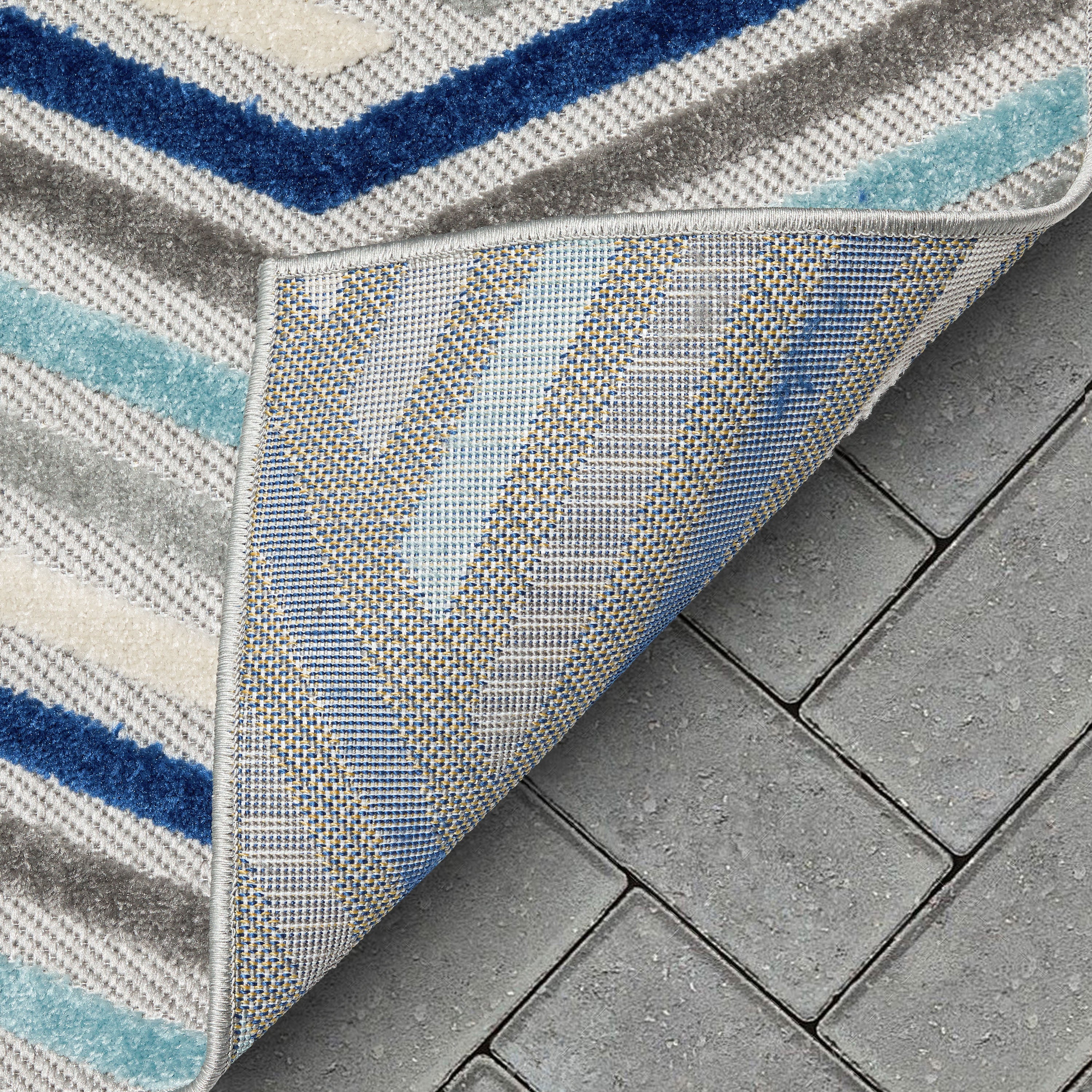 Neema Modern Chevron Striped Indoor/Outdoor Grey Blue High-Low Rug