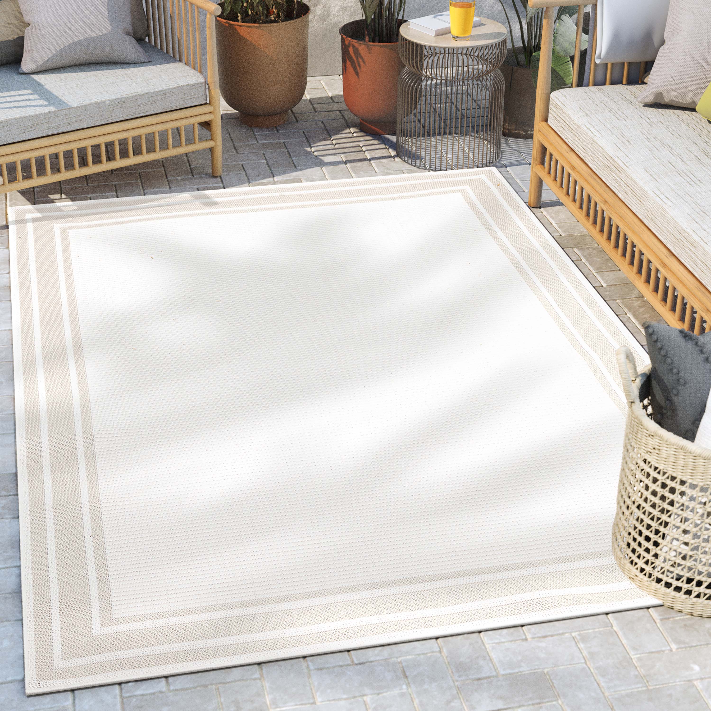 Perry Solid Border Pattern Indoor/Outdoor Ivory Textured Rug