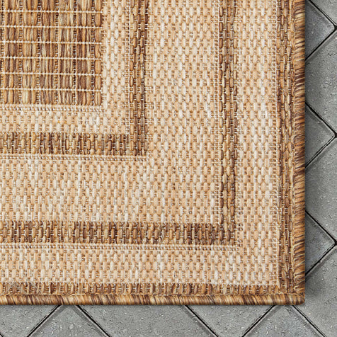Perry Solid Border Pattern Indoor/Outdoor Brown Textured Rug