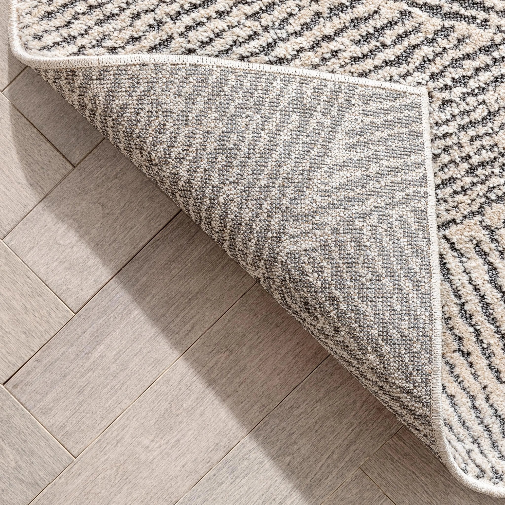 Enzo Tribal Geometric Lines Beige Distressed High-Low Rug Well Woven