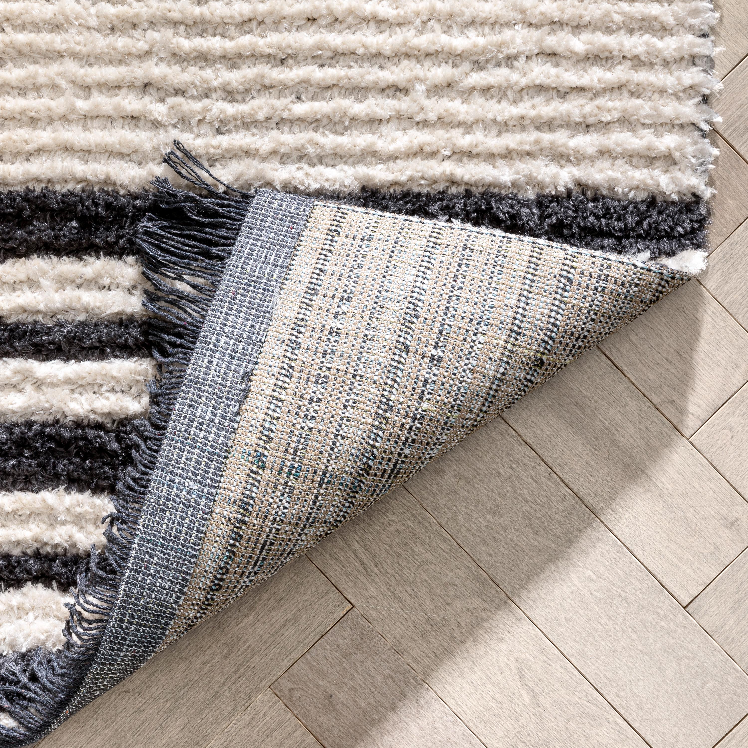 Adriel Tribal Solid Border Pattern Ivory High-Low Textured Pile Rug