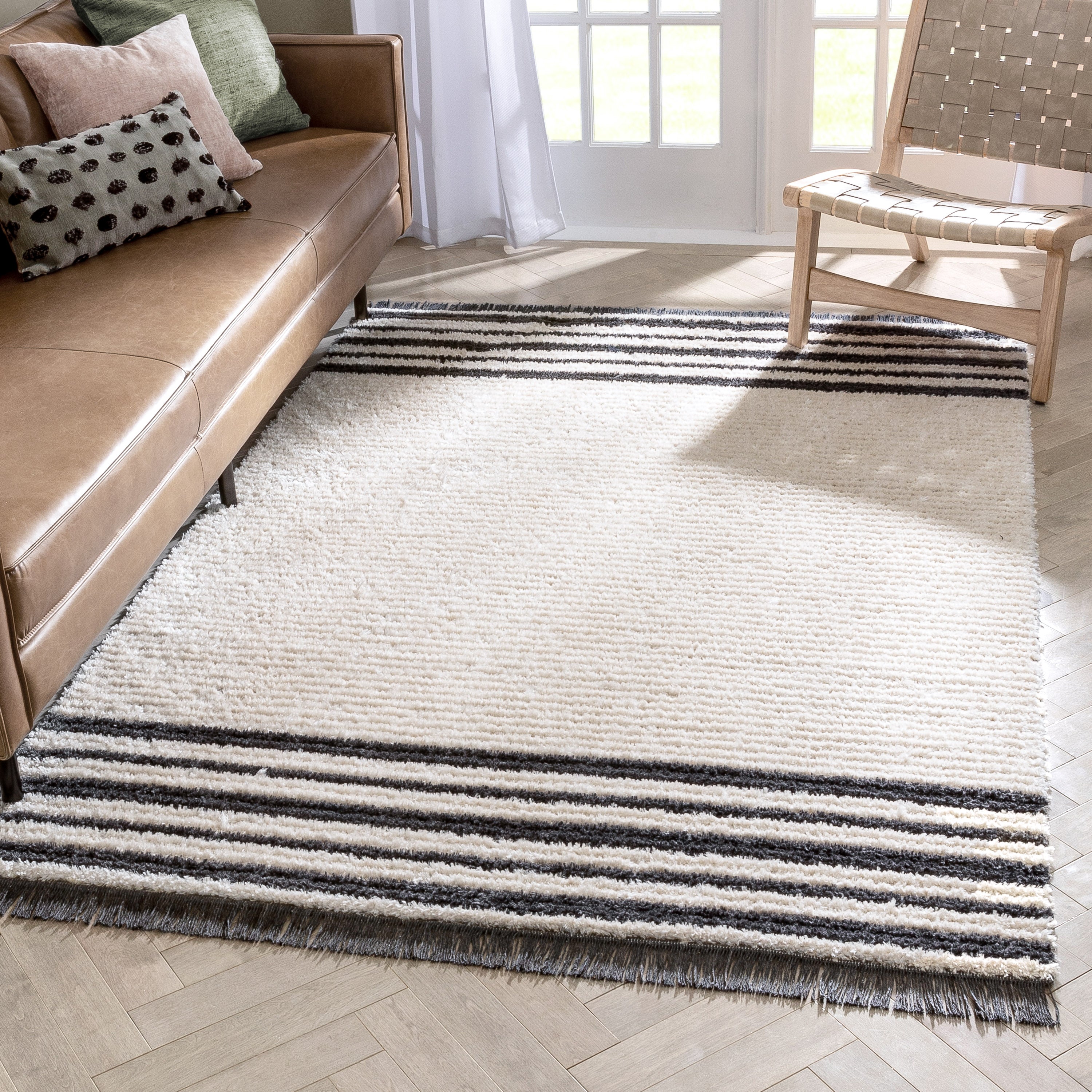 Adriel Tribal Solid Border Pattern Ivory High-Low Textured Pile Rug