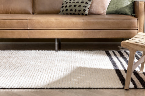 Adriel Tribal Solid Border Pattern Ivory High-Low Textured Pile Rug