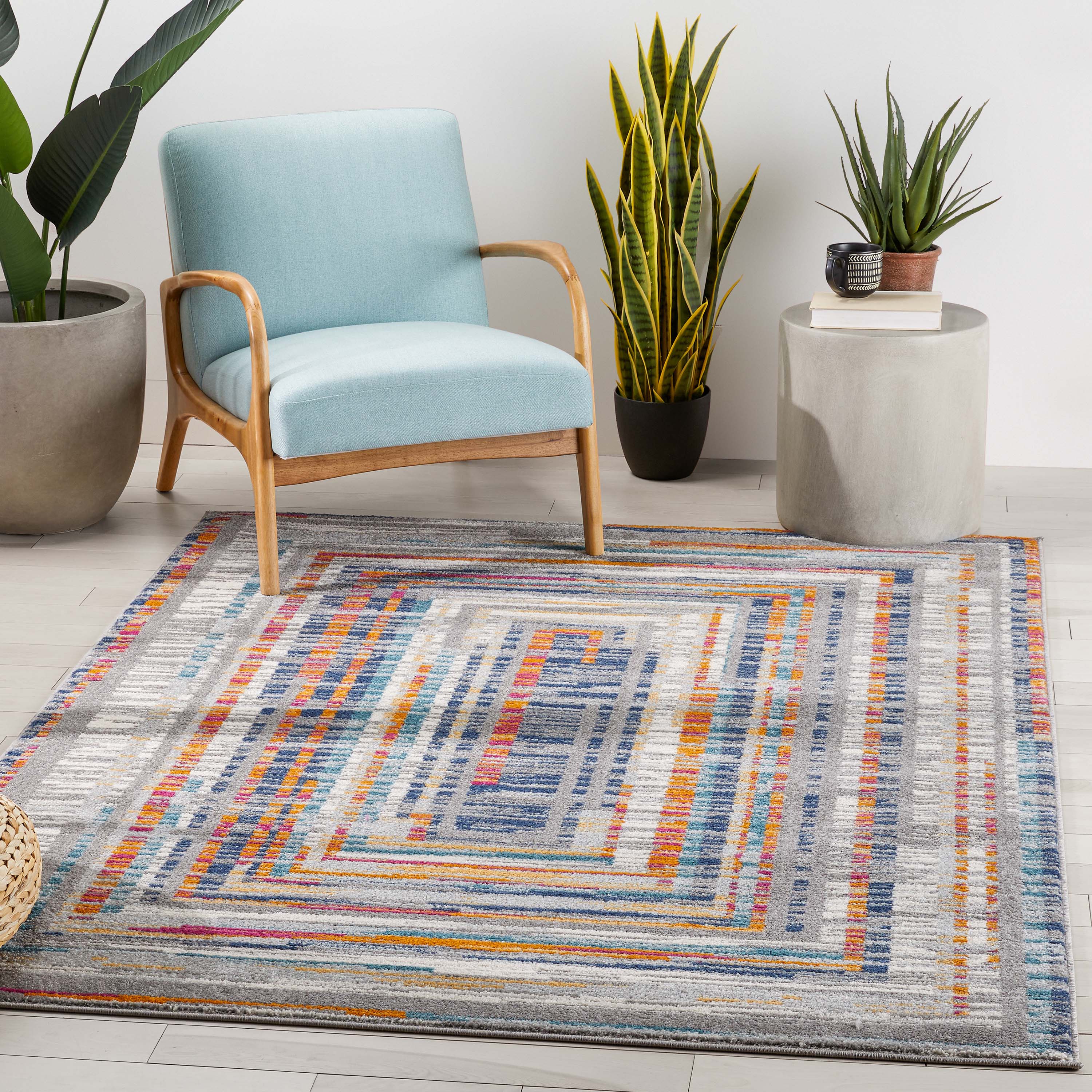 Merle Modern Geometric Border Light Blue Rug