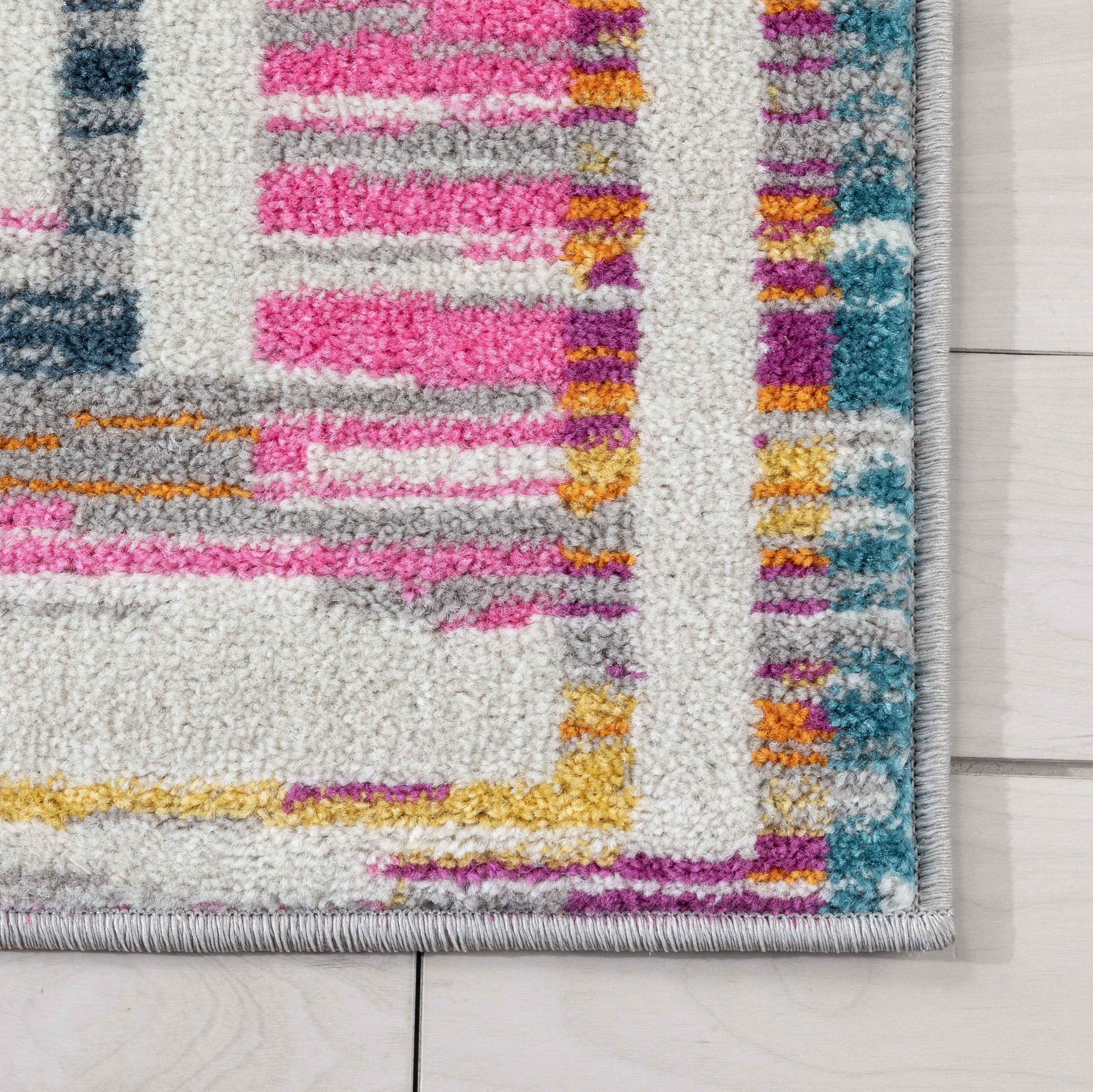 Merle Modern Geometric Border Fuchsia Rug