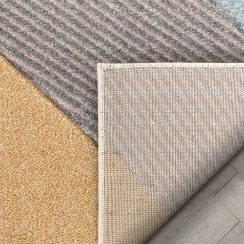 Alma Mid-Century Modern Geometric Triangle Pattern Multi Distressed High-Low Rug