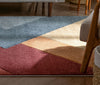 Alma Mid-Century Modern Geometric Triangle Pattern Multi-Color Distressed High-Low Rug